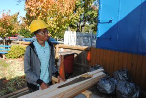 Construction student on job site.